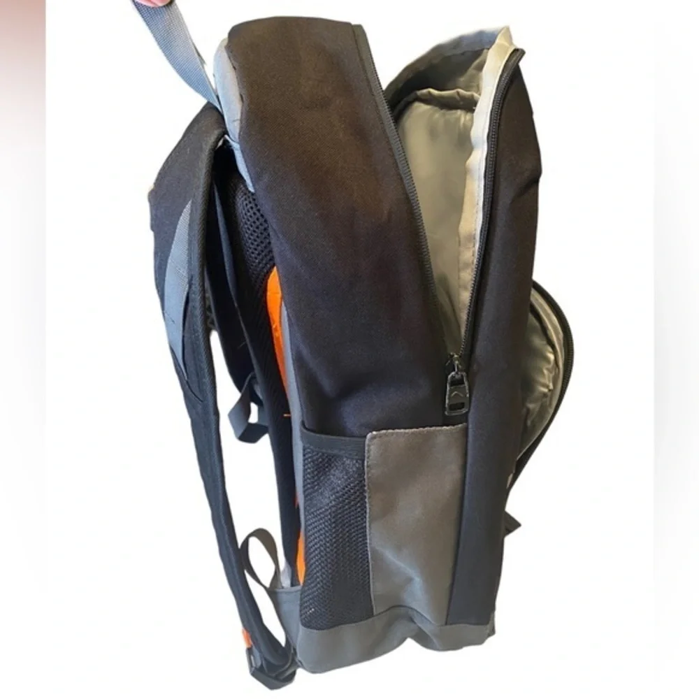 Quicksilver backpack book bag with laptop tablet sleeve. Orange and gray